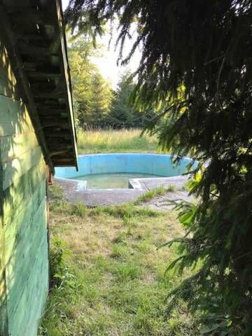 Фото номера Дом с 2 спальнями Дома для отпуска Kuvaszó casă la cheie г. Filia 33